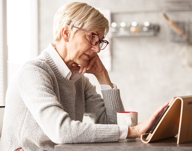 women using a tablet device